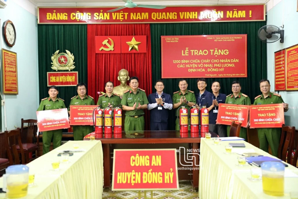 Donating 1,200 fire extinguishers to poor households