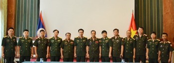 Quân đội Việt Nam và Lào thúc đẩy hợp tác trong lĩnh vực pháp chế