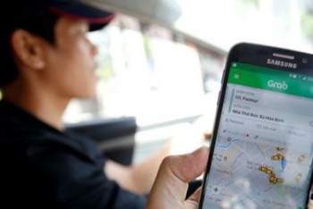 Tài xế Grab, Uber không đóng BHXH, cần sửa đổi Luật Lao động thế nào?