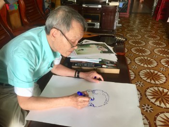 Người cựu chiến binh say mê vẽ chân dung Bác Hồ