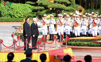 Hình ảnh lễ đón Tổng Bí thư, Chủ tịch nước Lào thăm chính thức Việt Nam