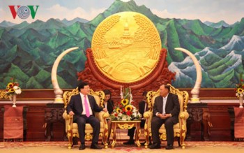 Phó Thủ tướng Chính phủ Trịnh Đình Dũng tiếp kiến lãnh đạo Lào