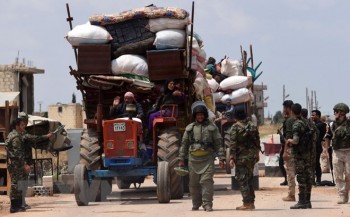 Syria: Khoảng 300 phiến quân đồng ý rời khỏi khu định cư ở Quneitra